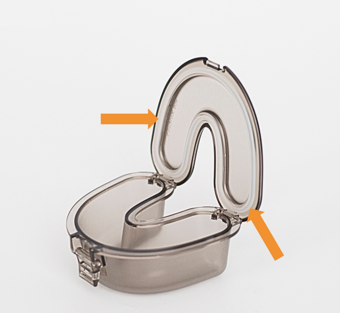 Checking the silicone seal is correctly positioned in the retainer case lid